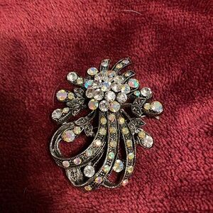 Vintage jeweled pin/pendant sparkling iridescent jewels, floral design.